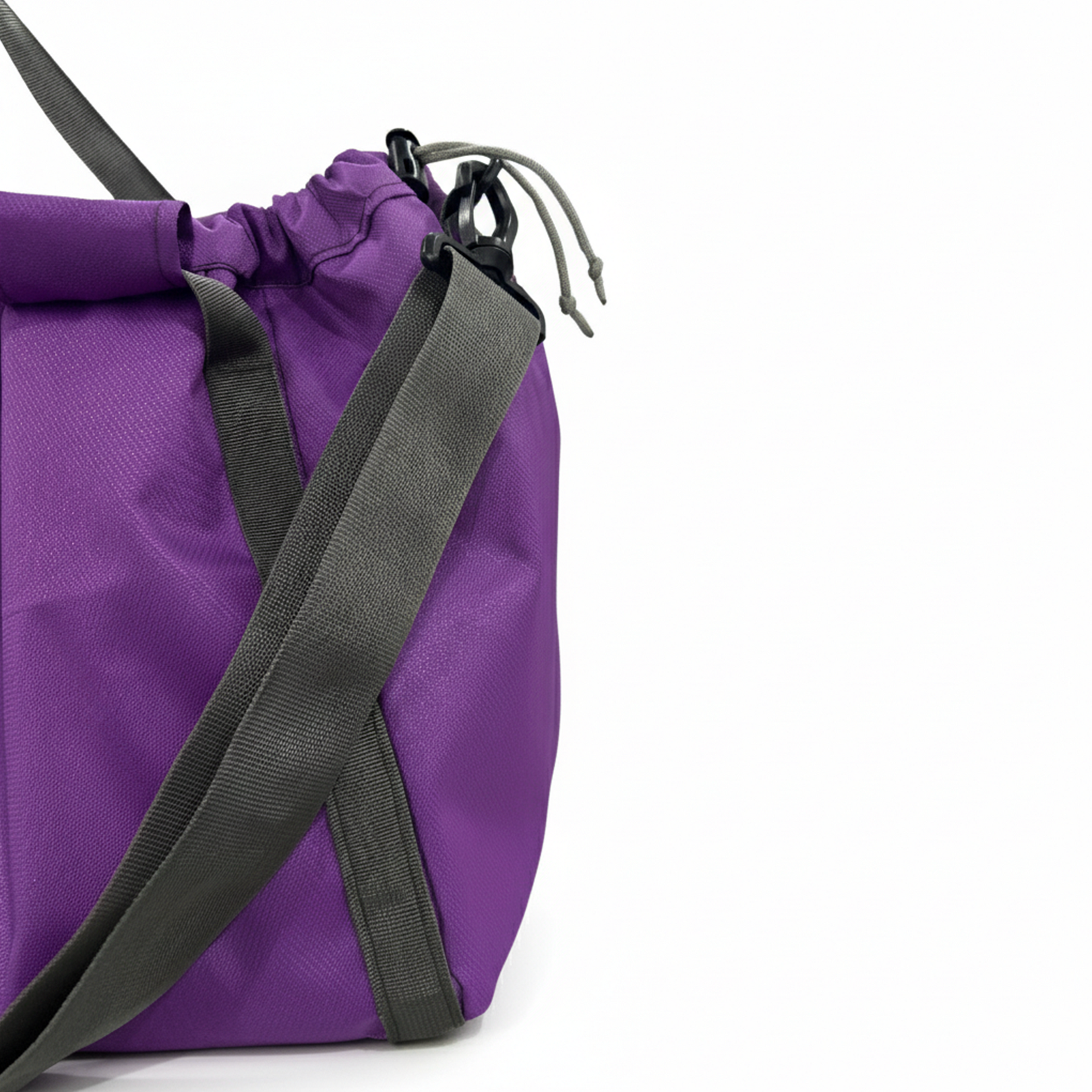 Side view of a purple nylon gym tote, showing the durable construction and straps.