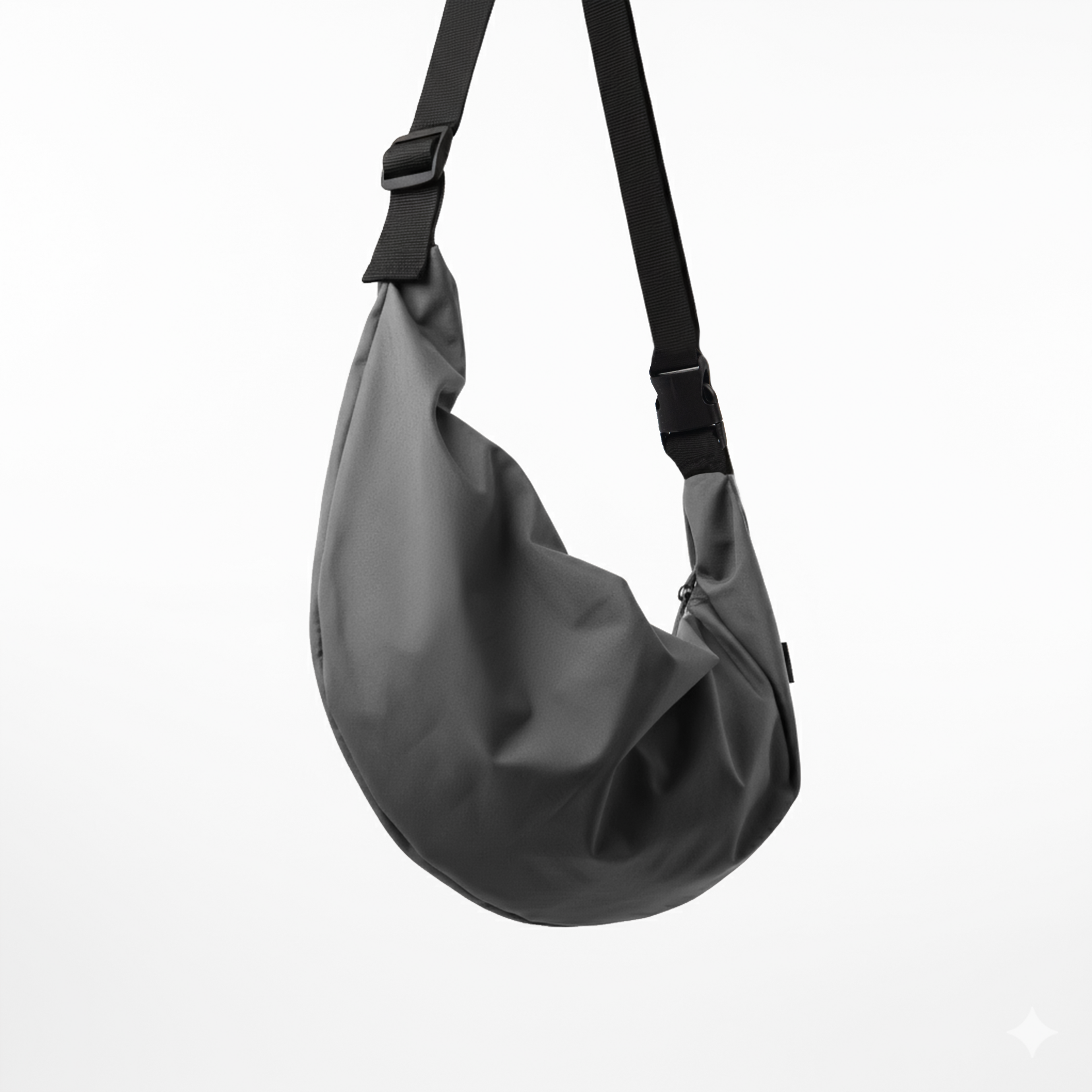 Side view of a grey water-resistant crescent bag, showing the adjustable strap.